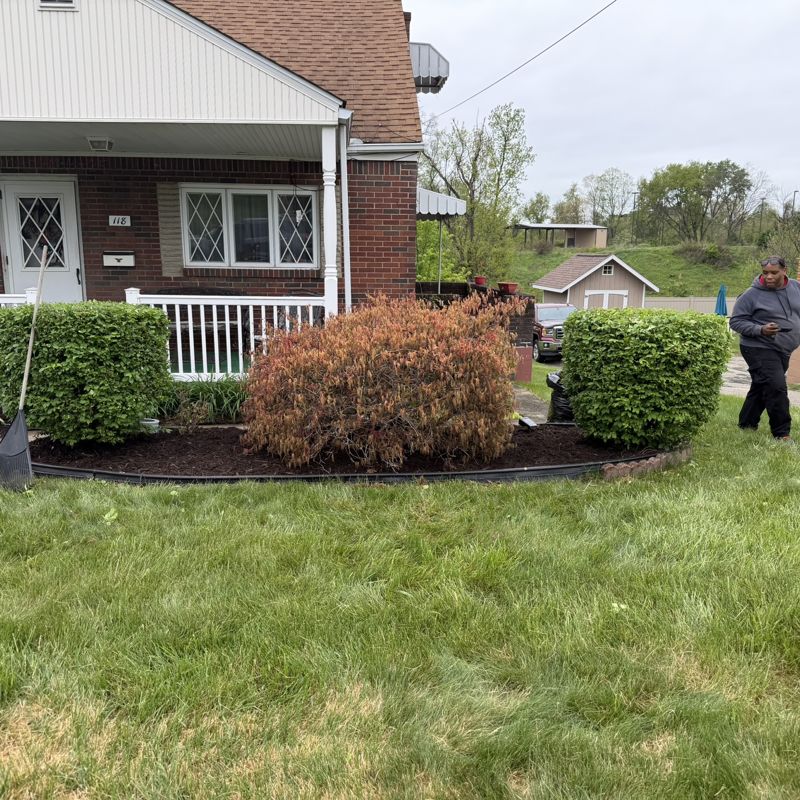 Finished home with manicured front yard